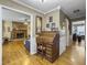 Hardwood floor hallway with a roll top desk and views into other rooms at 1001 Shinnecock Hills Ct, Summerville, SC 29483