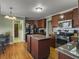Spacious kitchen with granite countertops, stainless steel appliances, and hardwood floors at 1001 Shinnecock Hills Ct, Summerville, SC 29483