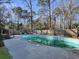 Above ground pool in backyard with wooden fence and American Flag at 1001 Shinnecock Hills Ct, Summerville, SC 29483
