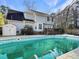 House with a backyard pool and deck at 1001 Shinnecock Hills Ct, Summerville, SC 29483
