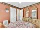 Bedroom with traditional wood furniture and an adjacent door, creating a bright, inviting space at 101 Winston Cir, Summerville, SC 29485