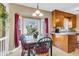 Charming dining area with a bay window, elegant lighting, and a cozy atmosphere for Gathering meals at 101 Winston Cir, Summerville, SC 29485