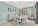 Formal dining room with chandelier, crown molding, and neutral carpet flooring at 101 Winston Cir, Summerville, SC 29485