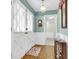 Inviting foyer with natural light, classic decor, and a glimpse into the home's bright, airy interior at 101 Winston Cir, Summerville, SC 29485
