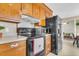 Cozy kitchen showcasing wood cabinets, modern appliances, and efficient layout for cooking and storage at 101 Winston Cir, Summerville, SC 29485