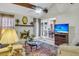 Inviting living area with a fireplace, ample seating, and seamless flow into the dining space at 101 Winston Cir, Summerville, SC 29485
