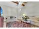 Comfortable living room with plush seating, ceiling fan, and warm accent lighting at 101 Winston Cir, Summerville, SC 29485