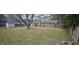 Spacious backyard featuring mature trees and a large shed for storage at 102 Barrington Blvd, Goose Creek, SC 29445