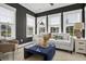 The open-concept living room showcases a modern design with an abundance of natural light at 108 Crosscut Ln, Summerville, SC 29486