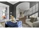 The open-concept design showcases a view of the modern living room and an adjoining staircase at 108 Crosscut Ln, Summerville, SC 29486