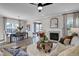 Inviting living room with fireplace, stylish decor, and an open floor plan to dining area at 108 Crosscut Ln, Summerville, SC 29486