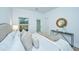 Bright main bedroom featuring neutral decor, a cozy bed, and modern decorations at 1304 Twin Rivers Dr # 56, Wando, SC 29492