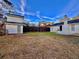 Spacious backyard showcasing a privacy fence and two outbuildings, ideal for entertaining and relaxing at 133 Larson Dr, Summerville, SC 29485