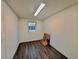 A basement offers hardwood floors, a window, and open space to fit your needs at 133 Larson Dr, Summerville, SC 29485