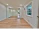 Bedroom featuring hardwood floors, mirror closet door, and a window for natural light at 133 Larson Dr, Summerville, SC 29485