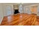 Spacious living room with a brick fireplace and hardwood floors at 133 Larson Dr, Summerville, SC 29485