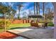 Spacious backyard with patio, seating area, and large yard at 1385 Fairfield Ave, Charleston, SC 29407