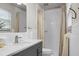 Clean bathroom with a shower/tub combo and updated vanity at 1385 Fairfield Ave, Charleston, SC 29407