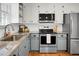 Updated kitchen with granite countertops and stainless steel appliances at 1385 Fairfield Ave, Charleston, SC 29407