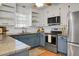 Updated kitchen with granite countertops and stainless steel appliances at 1385 Fairfield Ave, Charleston, SC 29407