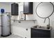 Laundry room with new cabinets, sink, and shelving at 1385 Fairfield Ave, Charleston, SC 29407