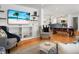 Bright living room with hardwood floors, comfortable seating and open concept design at 1385 Fairfield Ave, Charleston, SC 29407