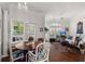 Open concept dining area with access to balcony at 1632 Telfair Way, Charleston, SC 29412