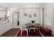 Dining area with wood table and white chairs at 1632 Telfair Way, Charleston, SC 29412