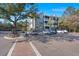 Gray building with ample parking and landscaping at 1632 Telfair Way, Charleston, SC 29412