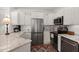Well-equipped kitchen with stainless steel appliances and ample counter space at 1632 Telfair Way, Charleston, SC 29412