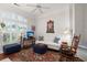 Living area with white couch and plantation shutters at 1632 Telfair Way, Charleston, SC 29412