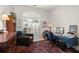 Home office featuring built-in shelving and a comfortable seating area at 1632 Telfair Way, Charleston, SC 29412