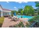 Inviting pool area with lounge chairs and patio seating at 1632 Telfair Way, Charleston, SC 29412