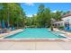 Inviting community pool with ample lounge chairs and patio tables at 1632 Telfair Way, Charleston, SC 29412