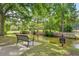 Serene waterfront view with a park bench and peaceful sitting area at 1632 Telfair Way, Charleston, SC 29412