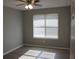 Simple bedroom with wood-look floors and neutral-colored walls at 186 Bridgecreek Dr, Goose Creek, SC 29445