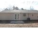 Back of house with patio and neutral vinyl siding at 186 Bridgecreek Dr, Goose Creek, SC 29445