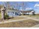 Charming home featuring a well-manicured lawn and a welcoming facade at 1904 Iris St, North Charleston, SC 29405