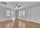 Bright living room with hardwood floors, large windows, and neutral paint at 1904 Iris St, North Charleston, SC 29405