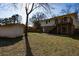 Large backyard with a deck, shed, and fenced area at 210 Drexel Rd, Ladson, SC 29456