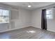 Bedroom with gray walls, wood floors and window at 210 Drexel Rd, Ladson, SC 29456
