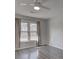 Bright bedroom with hardwood floors, large window, and neutral walls at 210 Drexel Rd, Ladson, SC 29456