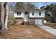 Two-story house with brick and siding, attached garage, and a landscaped yard at 210 Drexel Rd, Ladson, SC 29456