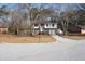 Two-story house with brick and siding, attached garage, and a landscaped yard at 210 Drexel Rd, Ladson, SC 29456