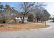 Two-story house with brick and siding, attached garage, and a landscaped yard at 210 Drexel Rd, Ladson, SC 29456