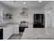Modern kitchen with stainless steel appliances and granite countertops at 210 Drexel Rd, Ladson, SC 29456