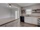 Modern kitchen with white cabinets, granite countertops, and stainless steel appliances at 210 Drexel Rd, Ladson, SC 29456