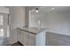 White kitchen counter with granite top and cabinets at 210 Drexel Rd, Ladson, SC 29456