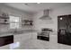 Modern kitchen with stainless steel appliances and granite countertops at 210 Drexel Rd, Ladson, SC 29456