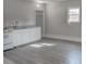 Small kitchen with white cabinets and granite countertop at 210 Drexel Rd, Ladson, SC 29456